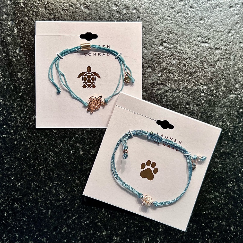 Lauren Conrad bracelets with turtle and paw print.